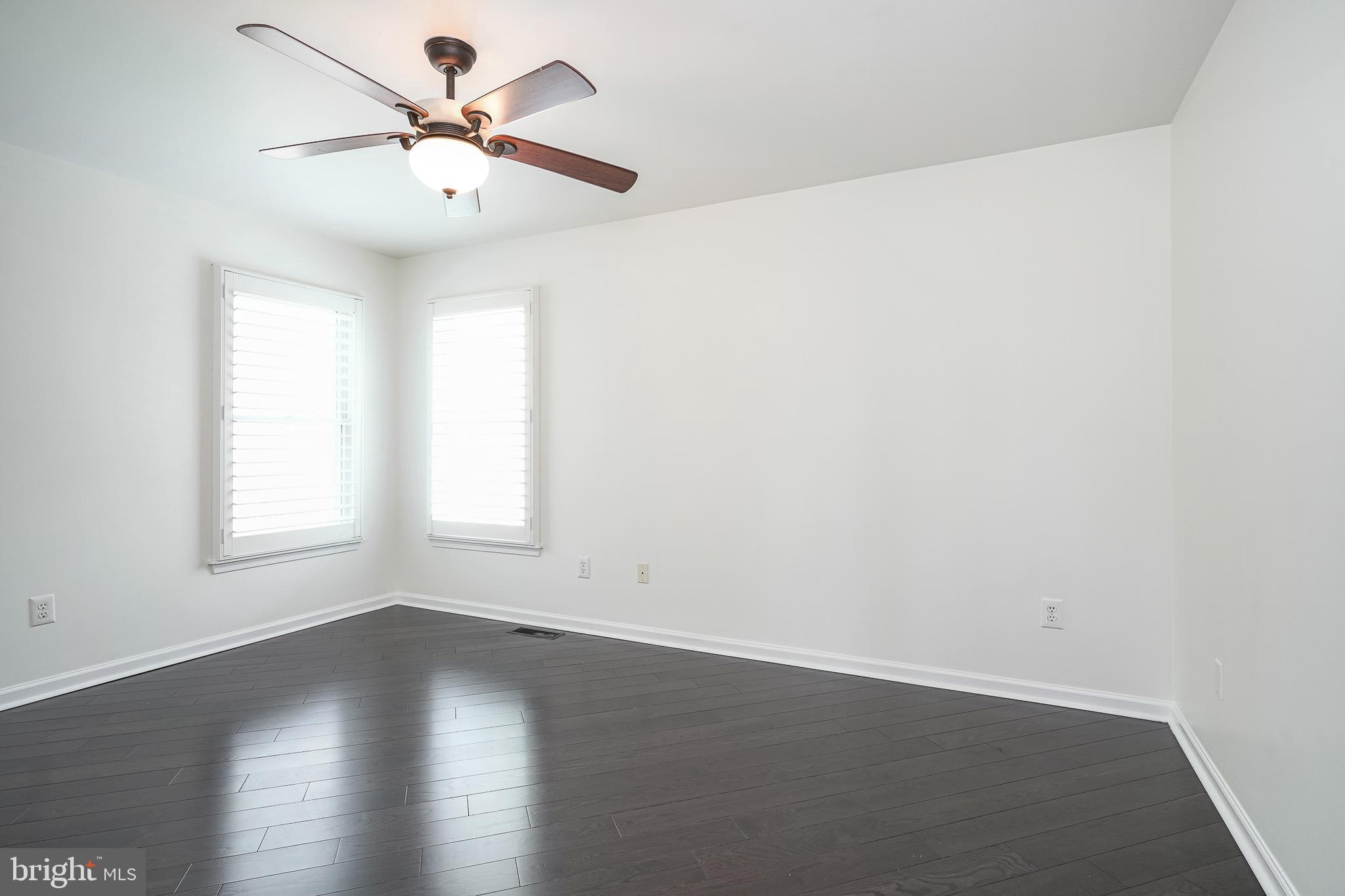 6101 Church Road Mount Laurel, NJ 08054 - Photo 37 of 64 an empty room with wooden floor and windows