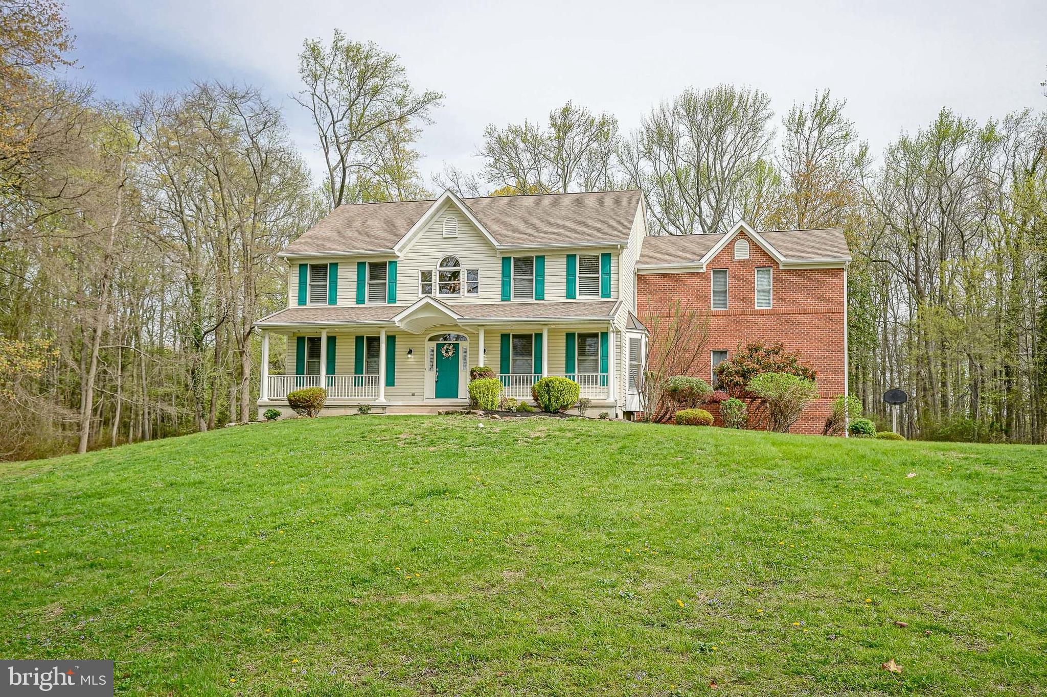 6101 Church Road Mount Laurel, NJ 08054 - Photo 4 of 64 a front view of a house with a garden