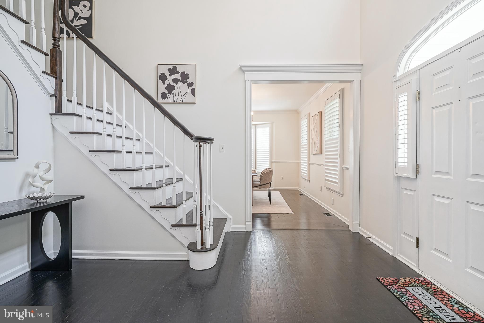 6101 Church Road Mount Laurel, NJ 08054 - Photo 9 of 64 a view of entryway and hall with wooden floor