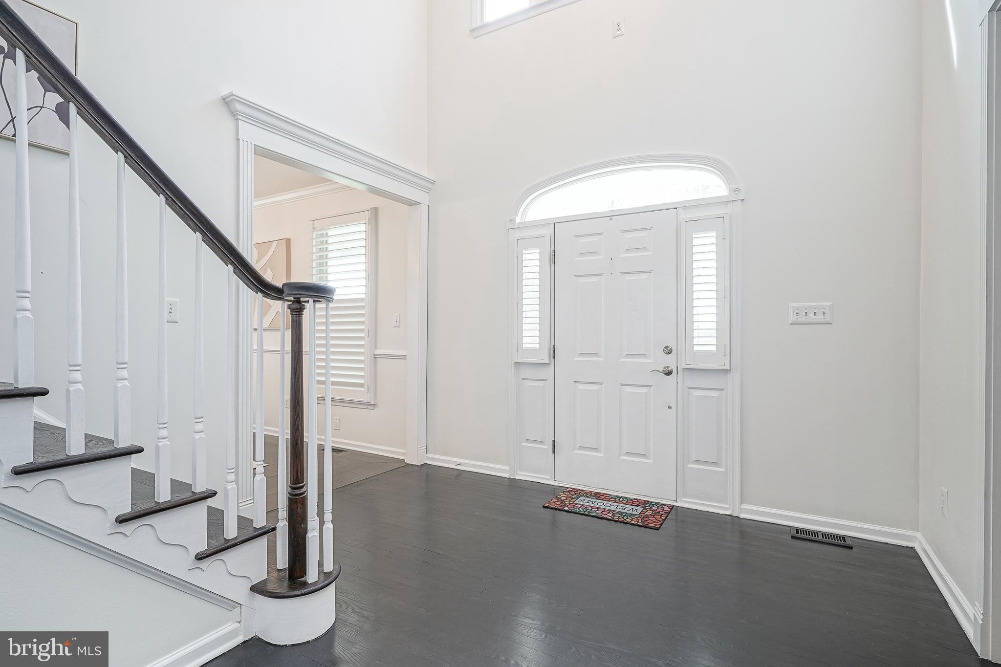 6101 Church Road Mount Laurel, NJ 08054 - Photo 10 of 64 a view of an entryway with wooden floor