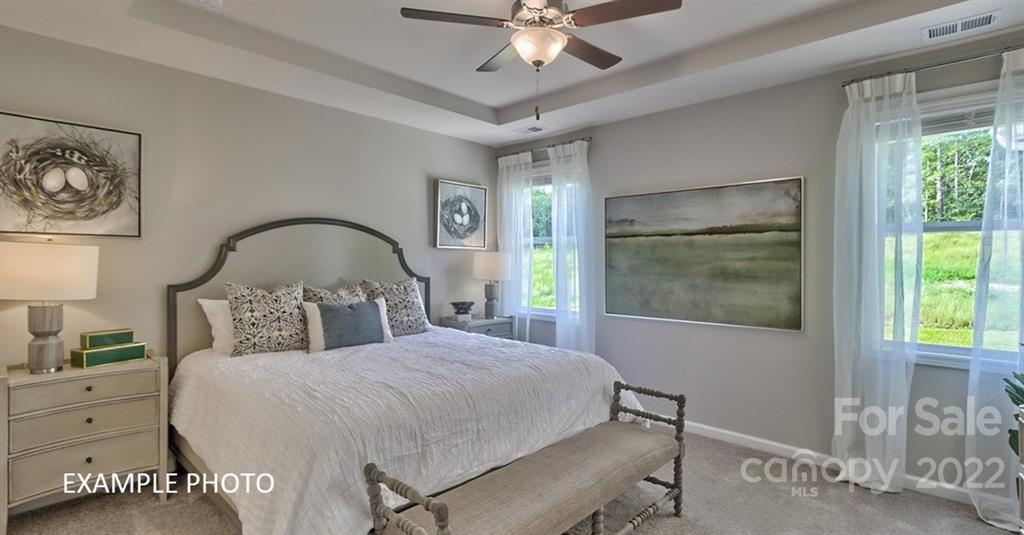 7200 Indigo Way Denver, NC 28037 - Photo 11 of 11 a bedroom with a bed and a window