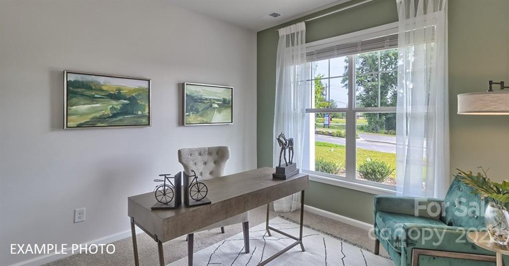 7200 Indigo Way Denver, NC 28037 - Photo 7 of 11 a view of a workspace with furniture and a window