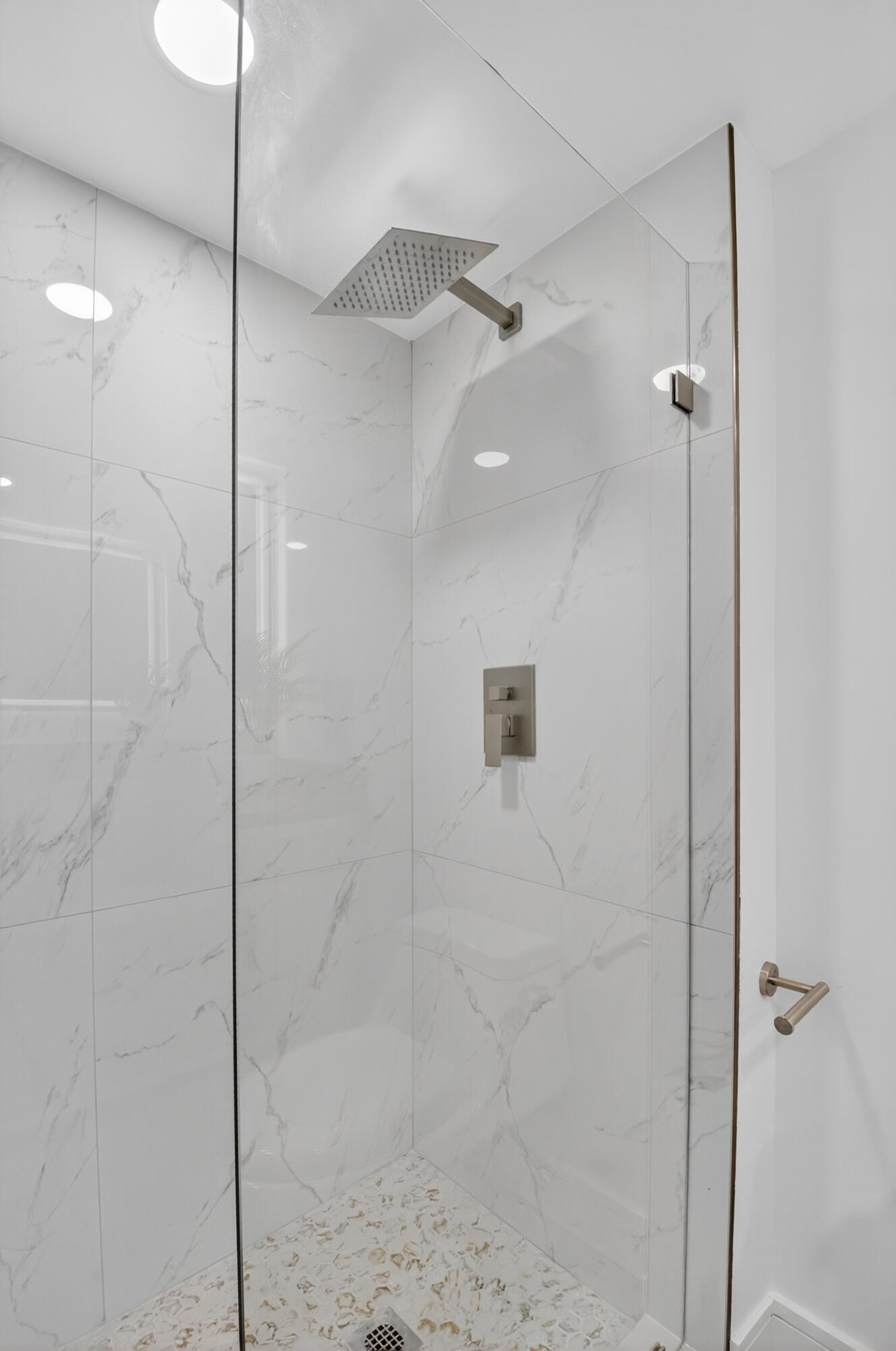 9880 Marina Boulevard, Unit 1509 Boca Raton, FL 33428 - Photo 19 of 43 a bathroom with a shower