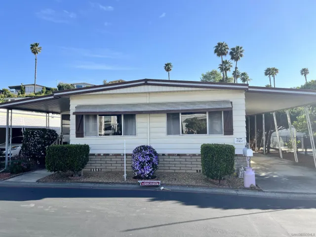 a front view of a house with a porch