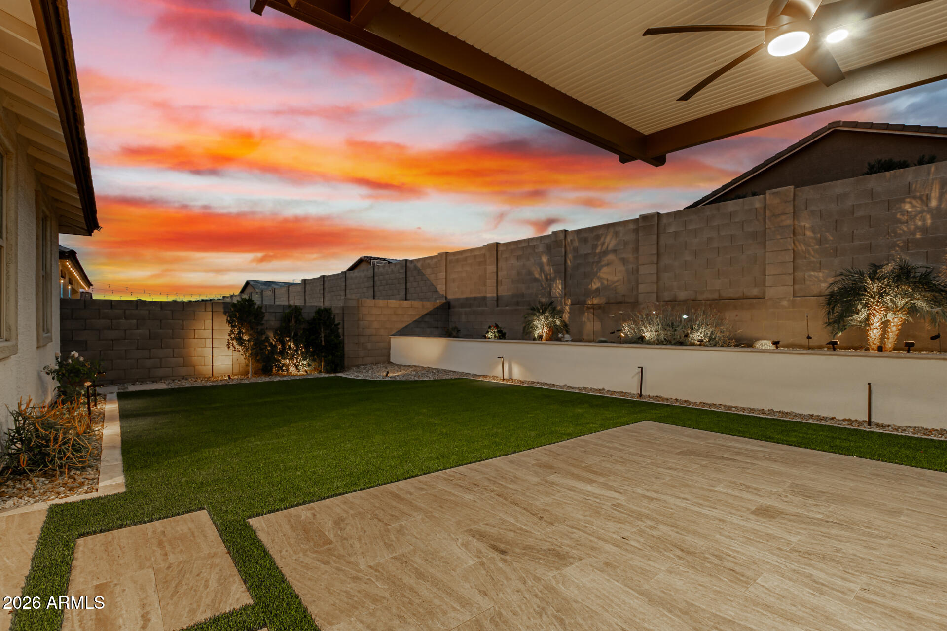 11985 South 173rd Avenue Goodyear, AZ 85338 - Photo 39 of 78 backyard patio area at twilight