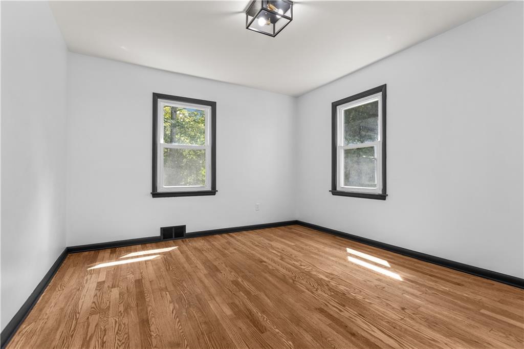 146 Ridgewood Road Coraopolis, PA 15108 - Photo 17 of 31 wooden floor in an empty room with a window