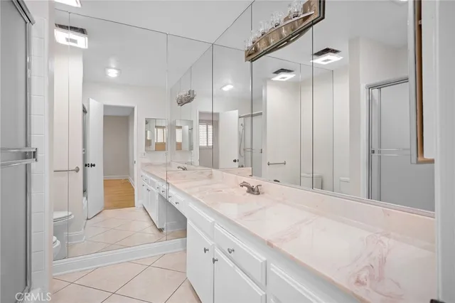 a bathroom with a shower and a toilet