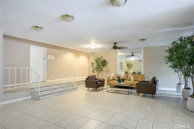 a view of parking garage with cars parked