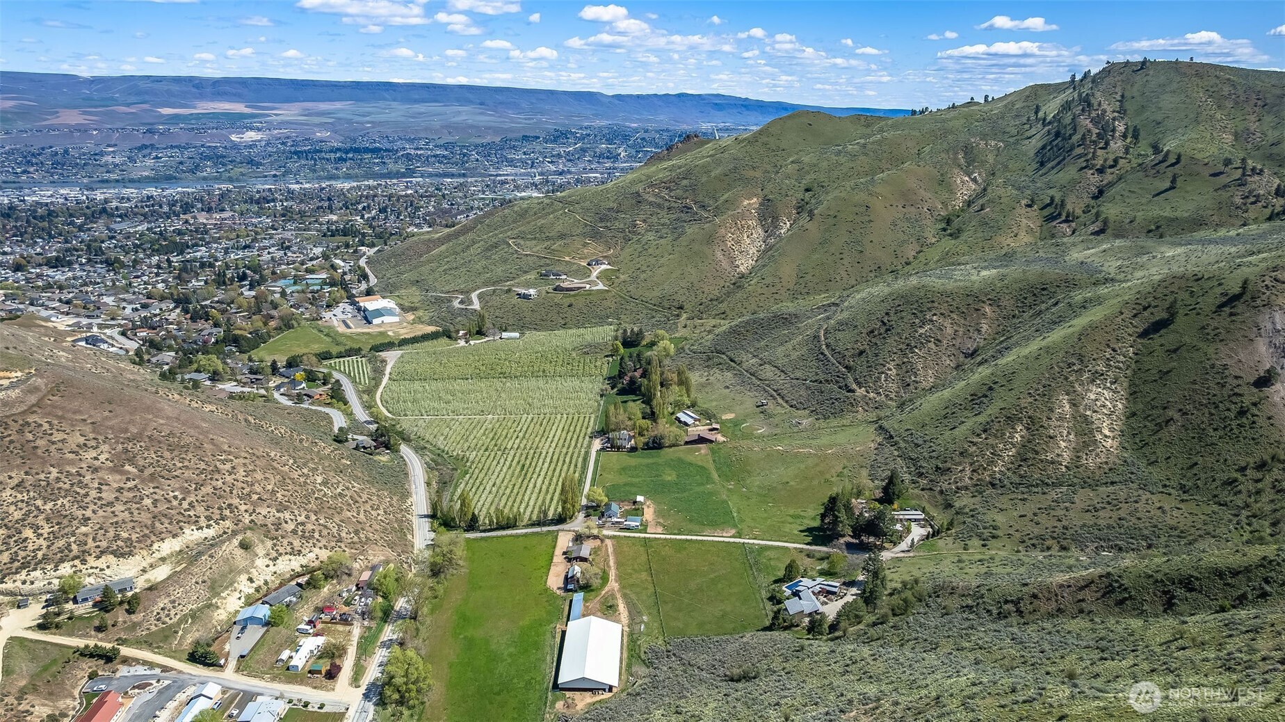 -nna Number 2 Canyon Road Wenatchee, WA 98801 - Photo 13 of 29 an aerial view of a houses with a yard