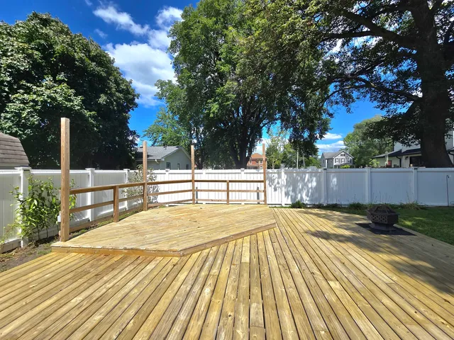 a view of a swimming pool with a lounge chairs