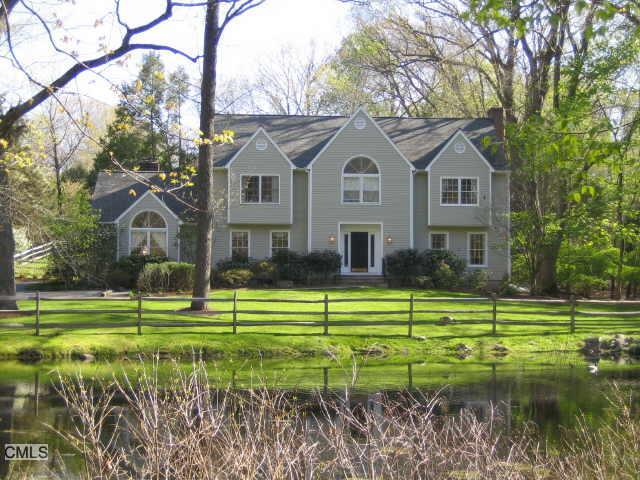 29 Ridge Lane Wilton, CT 06897 - Photo 1 of 1 a view of a house with a yard