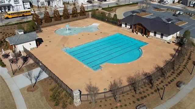an aerial view of a house with outdoor space