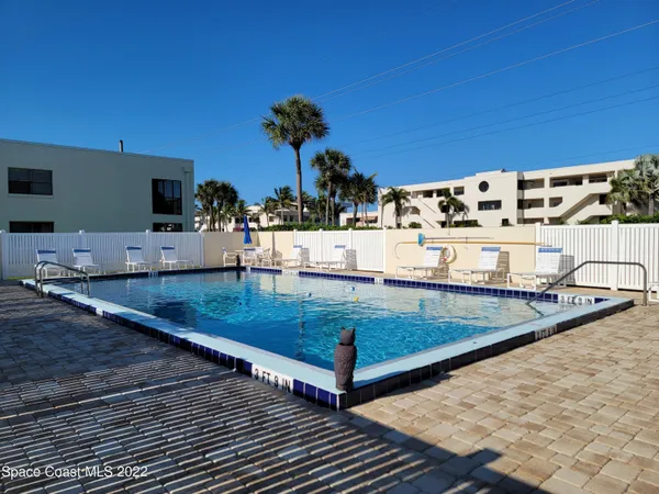 a view of a living room and dining room