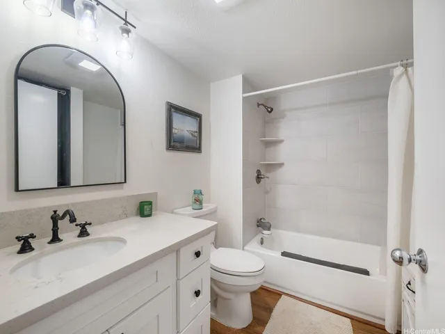 a close view of a utility room with dryer and washer