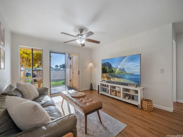 a view of a livingroom from a hallway