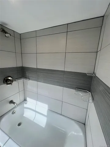 a bathroom with a bathtub