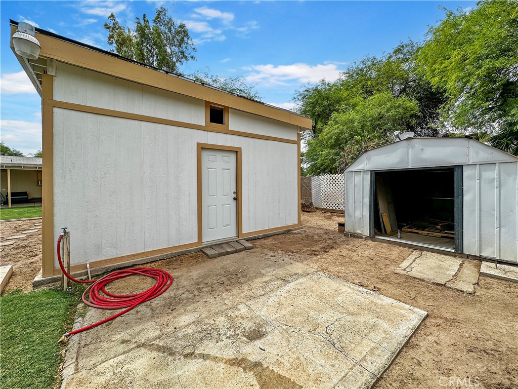 2224 Riviera Drive Blythe, CA 92225 - Photo 20 of 23 a backyard of a house with yard and outdoor seating
