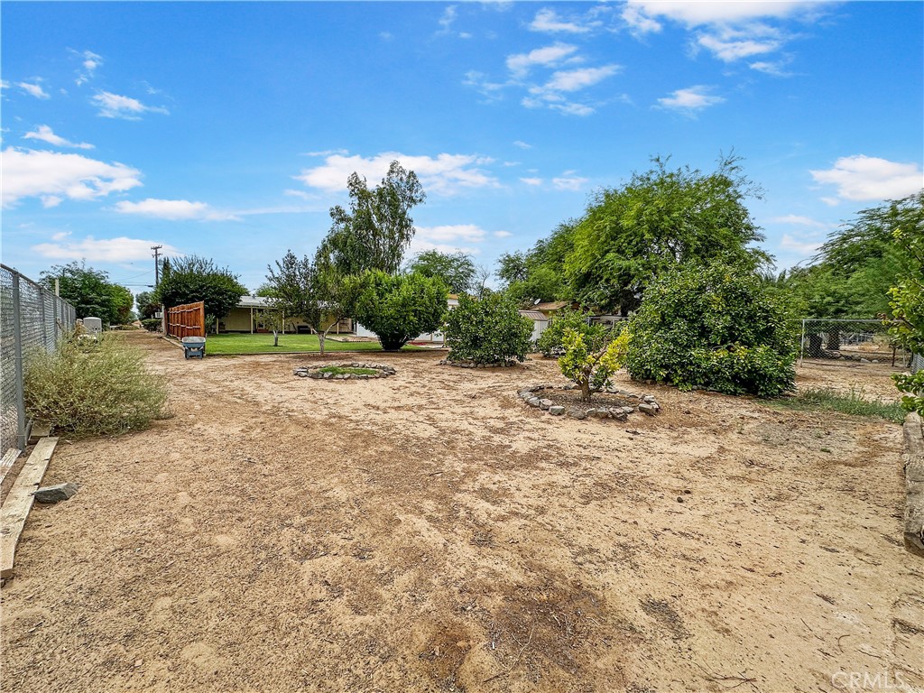 2224 Riviera Drive Blythe, CA 92225 - Photo 21 of 23 a view of a yard with trees
