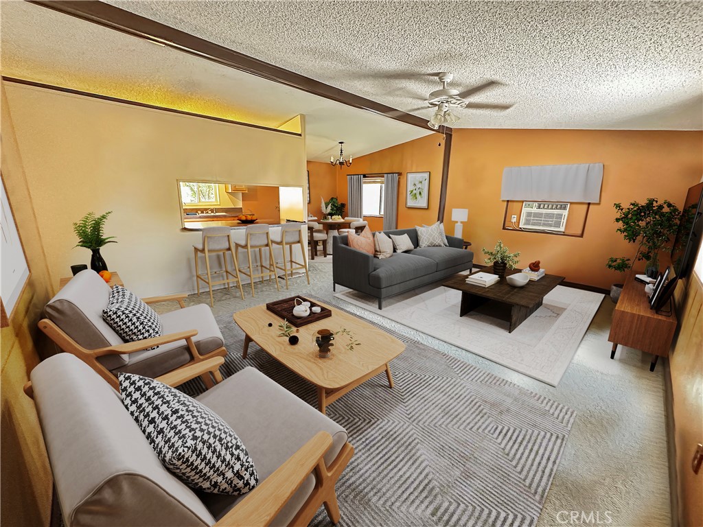 2224 Riviera Drive Blythe, CA 92225 - Photo 6 of 23 a living room with furniture a rug and a flat screen tv