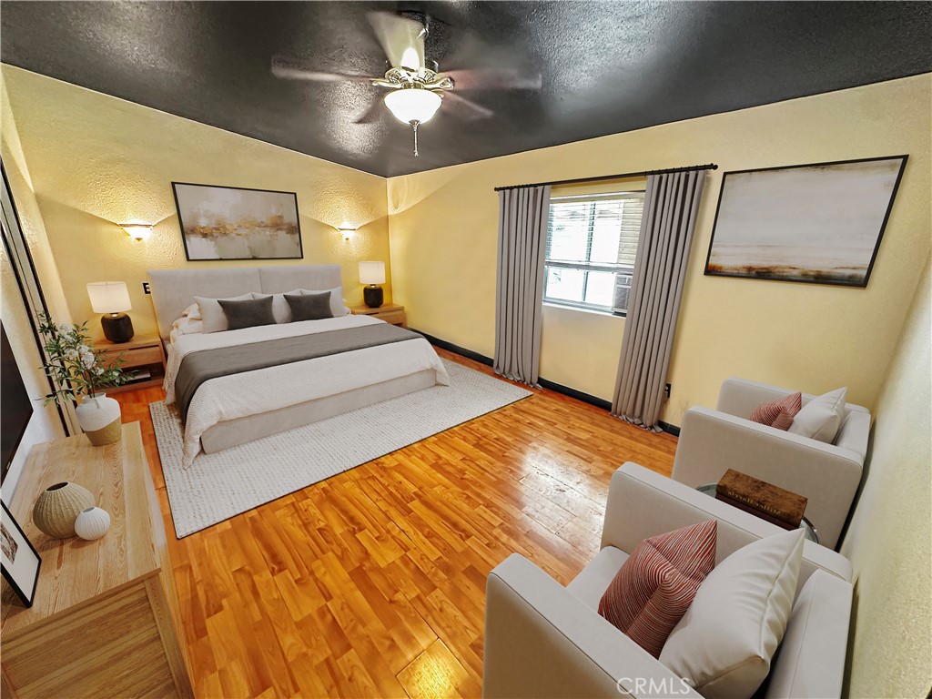 2224 Riviera Drive Blythe, CA 92225 - Photo 10 of 23 a bedroom with a bed couch and window