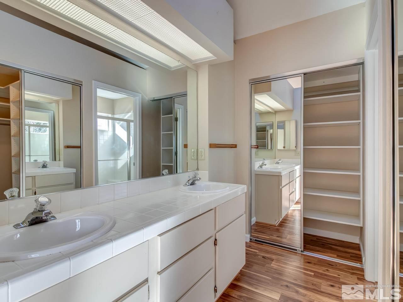 2678 Alpine Creek Road Reno, NV 89519 - Photo 16 of 25 a en suite bathroom with a sink and mirror