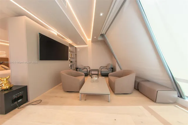 a living room with a table and a table