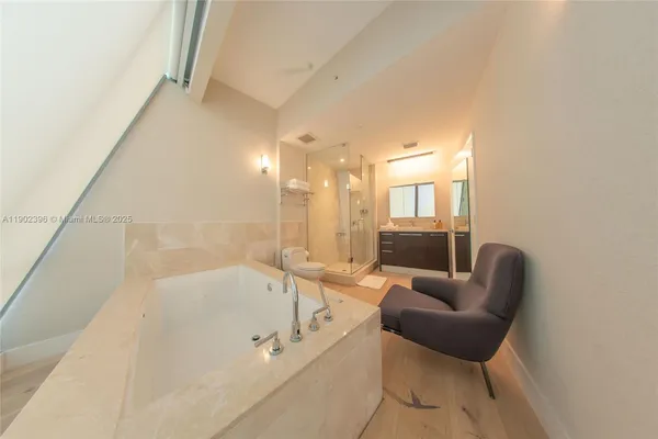a kitchen with granite countertop a oven and a cabinets