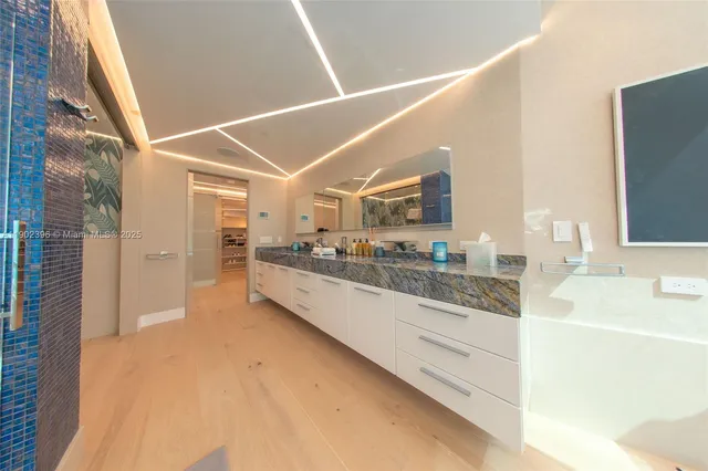 a front view of a residential apartment building with a yard