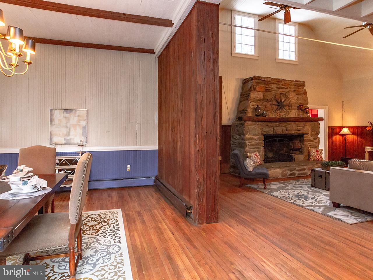 2504 West Ruhl Road Freeland, MD 21053 - Photo 37 of 43 a living room with furniture and a fireplace
