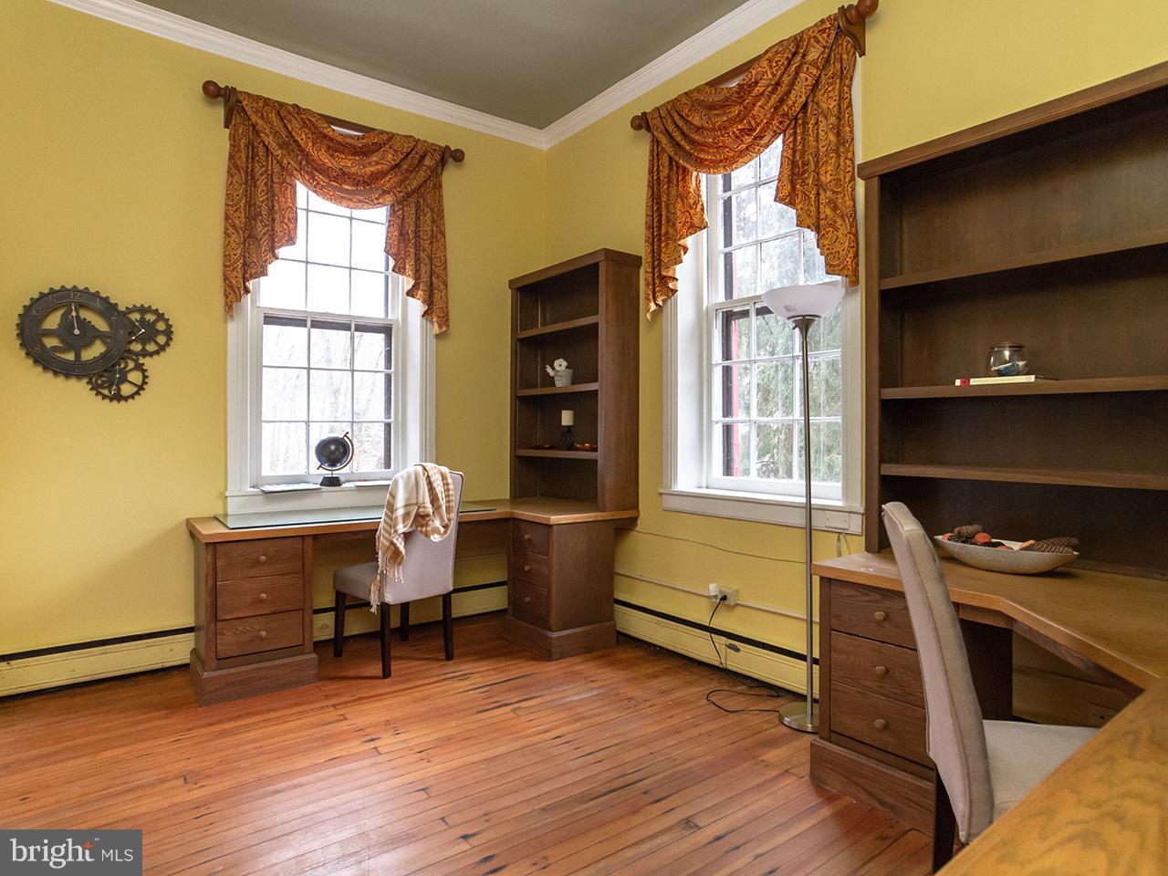2504 West Ruhl Road Freeland, MD 21053 - Photo 6 of 43 a bedroom with a bed and a window