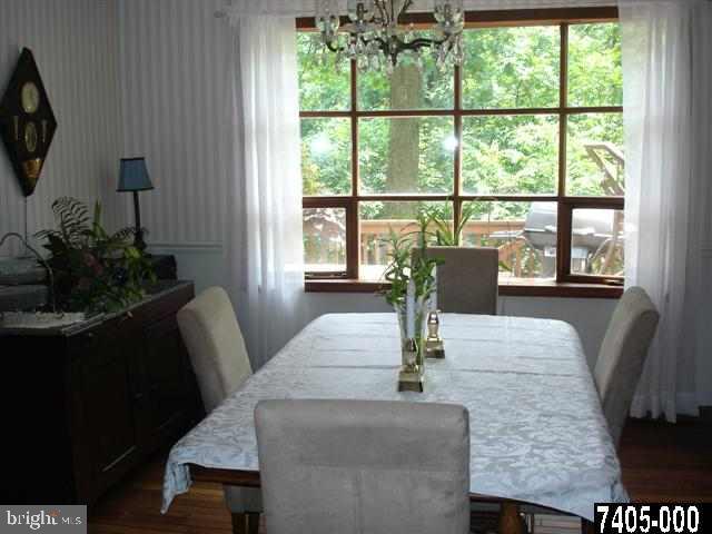 5042 Rislyn Court Spring Grove, PA 17362 - Photo 3 of 15 a living room with furniture and a potted plant