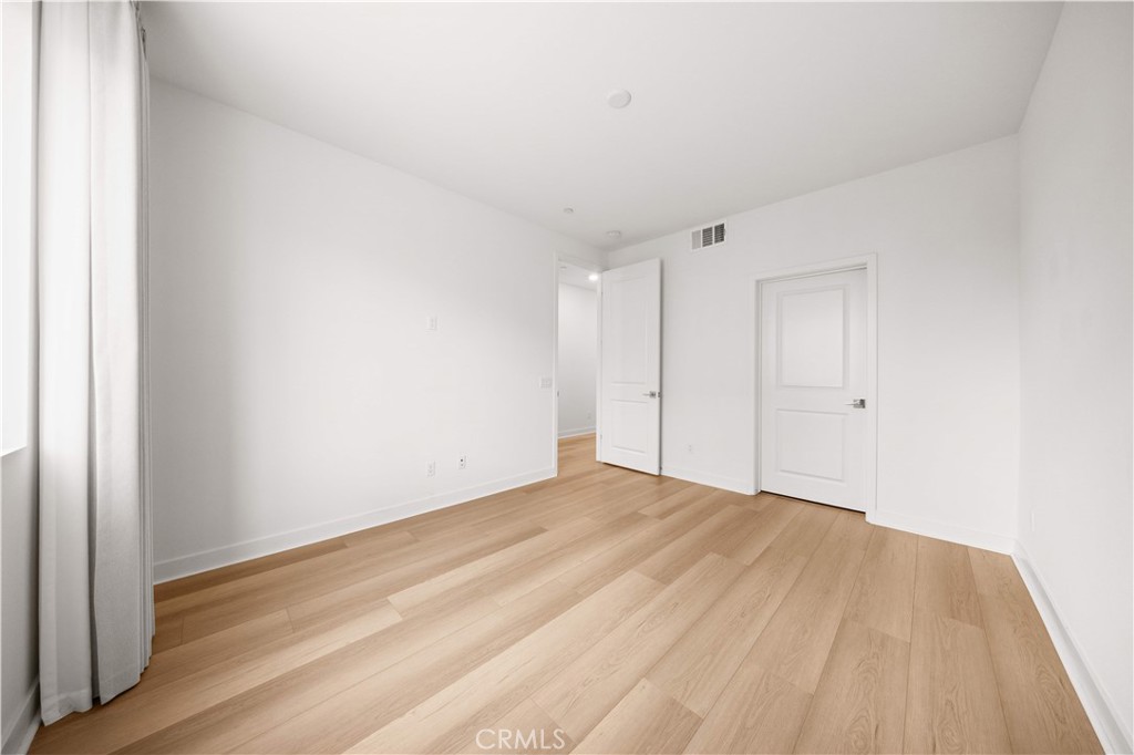 312 Tank Irvine, CA 92618 - Photo 13 of 75 a view of empty room with wooden floor