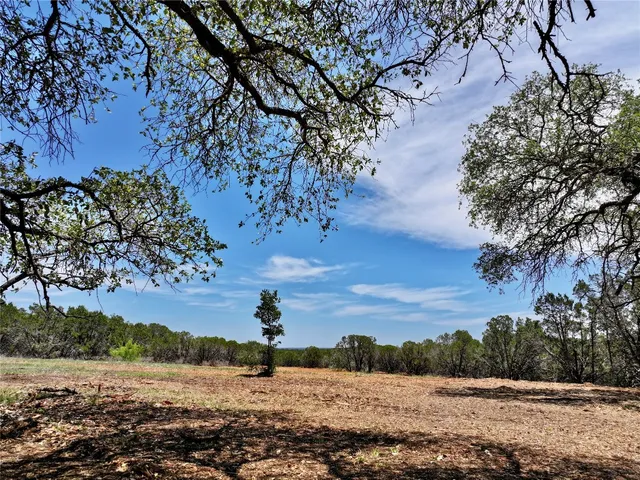 a view of lake view with mountain and trees around