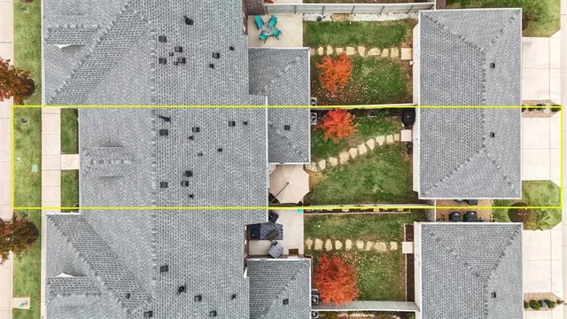 a front view of a house with yard