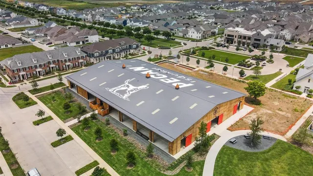 a kitchen with a table and chairs in it