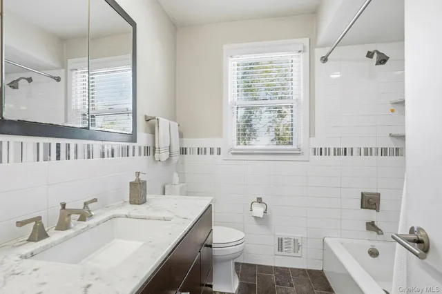 a bathroom with a sink and a toilet