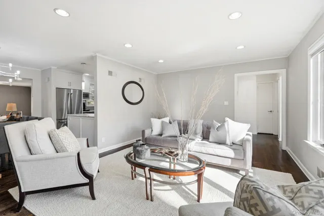 a living room with furniture and a couch