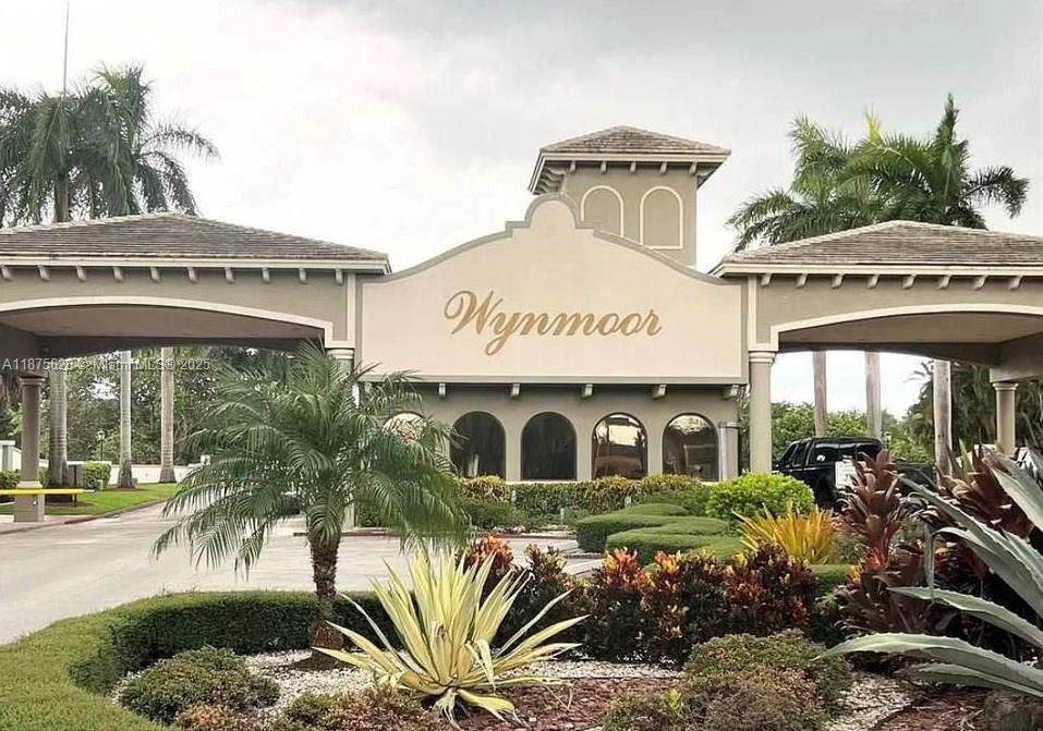 a front view of a building with garden