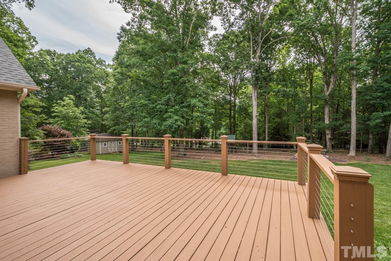 2505 Countrywood Road Raleigh, NC 27615 - Photo 14 of 36 a view of deck with a large trees