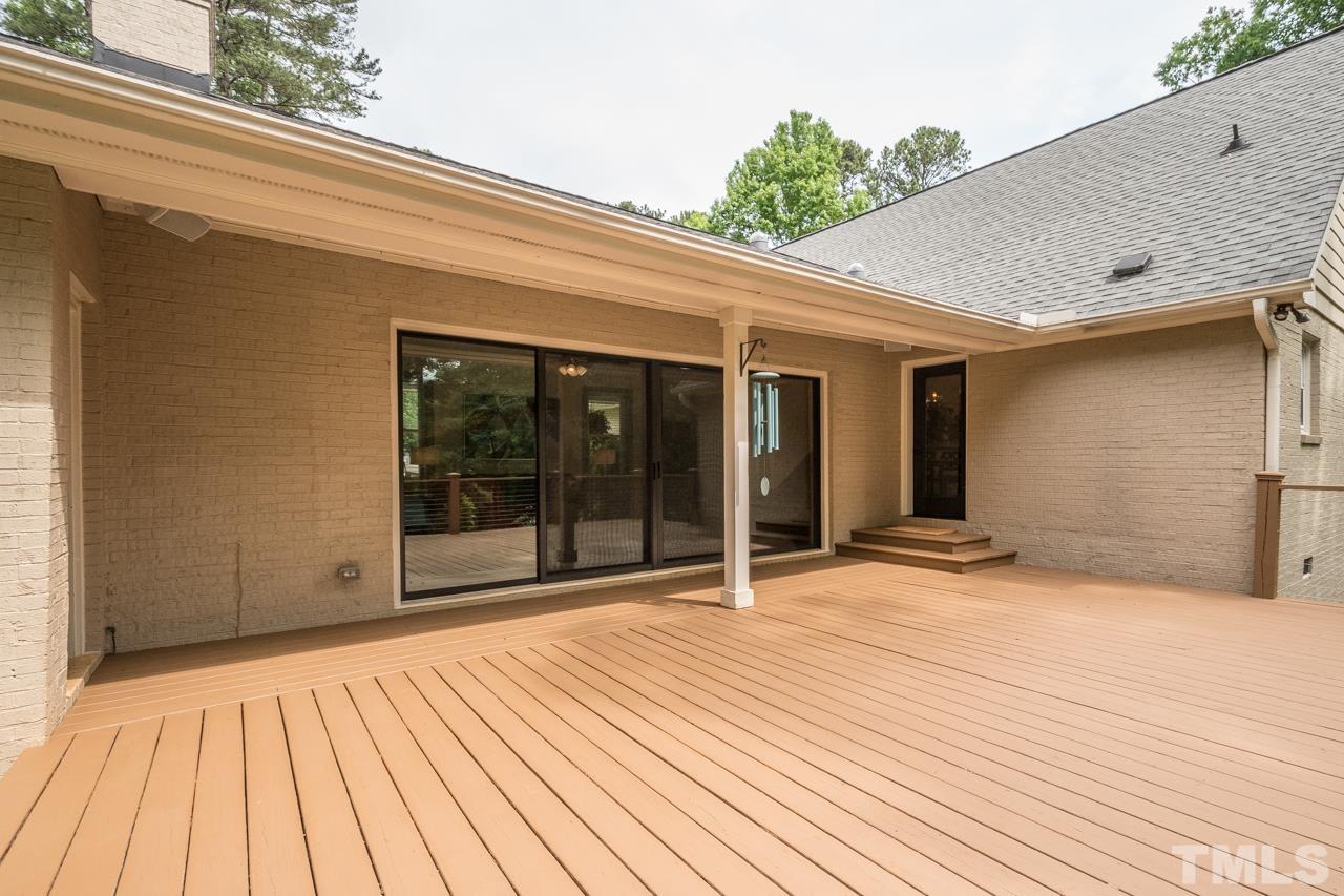 2505 Countrywood Road Raleigh, NC 27615 - Photo 22 of 36 a view of a backyard of a house