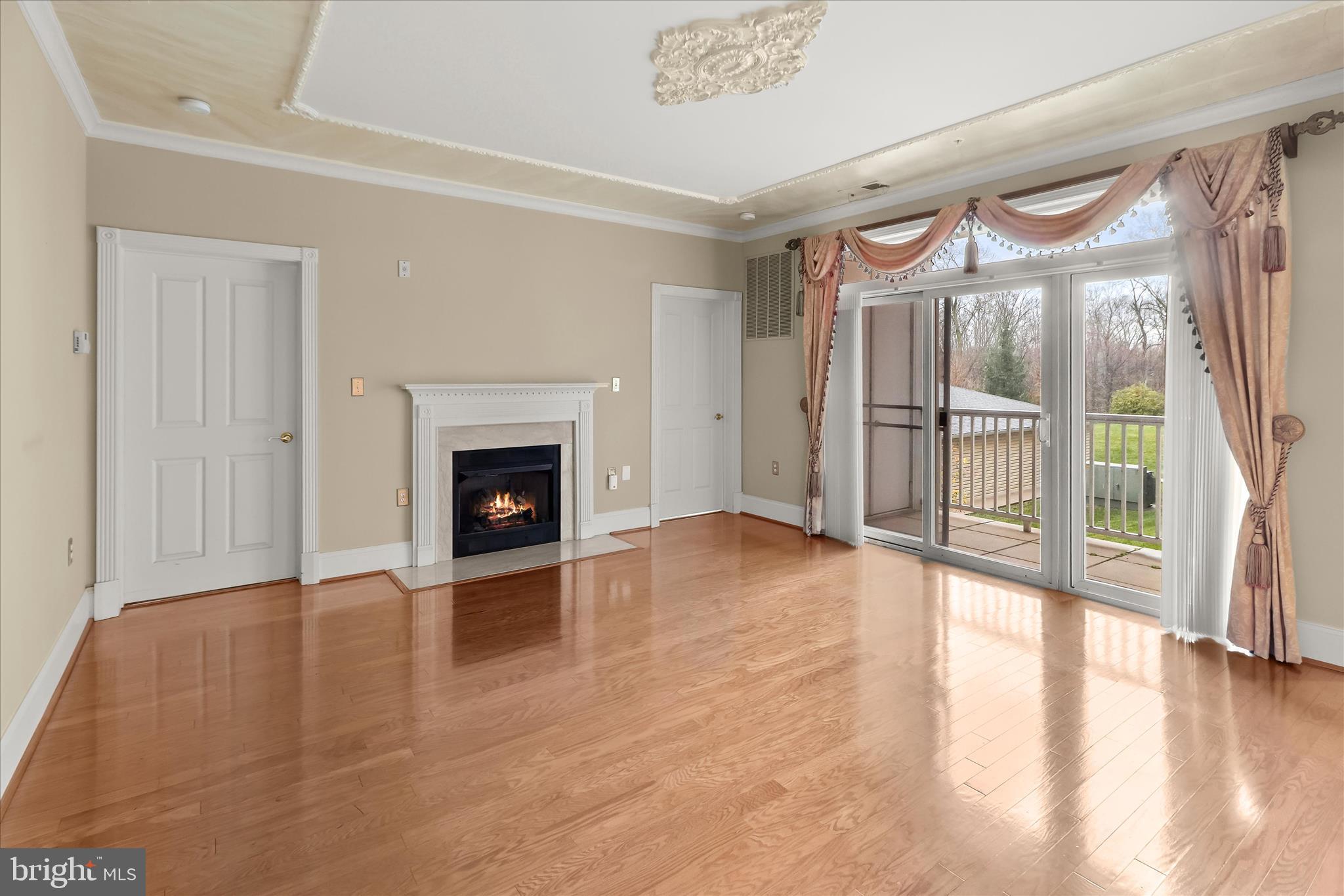 2250 Bear Den Road, Unit 104 Frederick, MD 21701 - Photo 12 of 81 Living Room - Access to Balcony