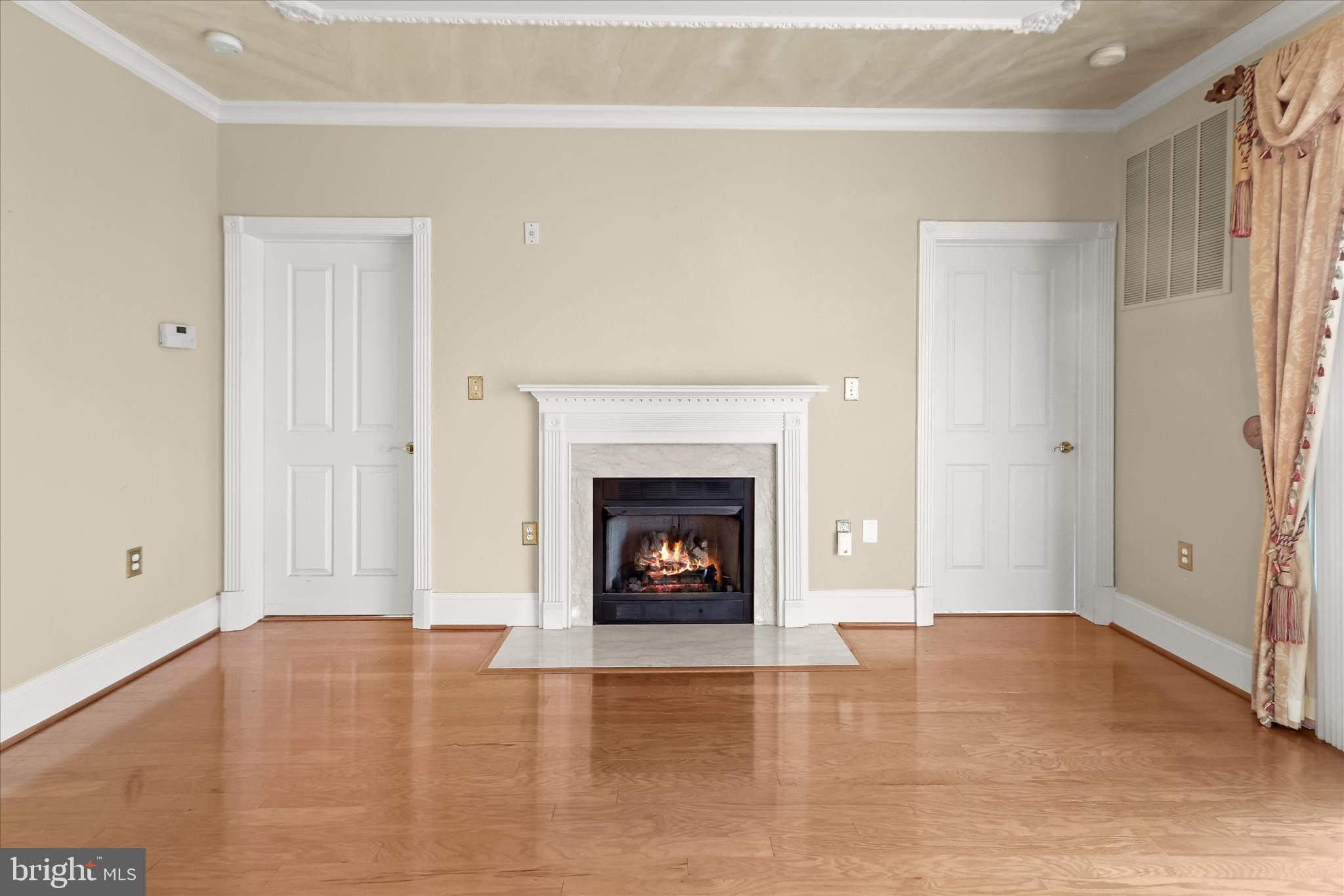 2250 Bear Den Road, Unit 104 Frederick, MD 21701 - Photo 13 of 81 Living Room - Fireplace - Hardwood Floors