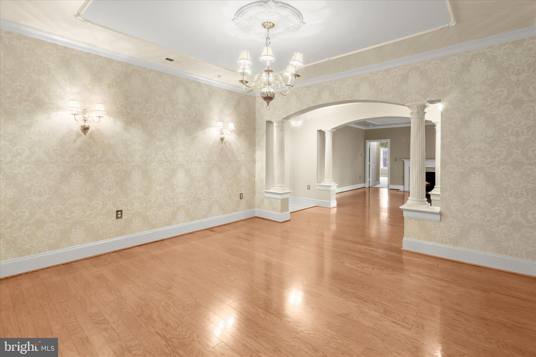 2250 Bear Den Road, Unit 104 Frederick, MD 21701 - Photo 15 of 81 Dining Room - Sconces - Hardwood Floors