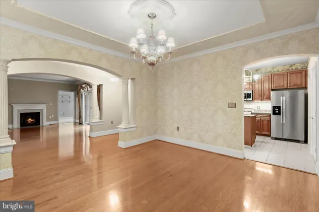 a kitchen with stainless steel appliances granite countertop a stove and a sink