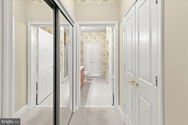 a very nice looking room with a large window and a glass door shower