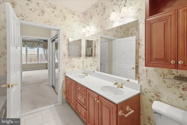 a big room with windows and pillars in it