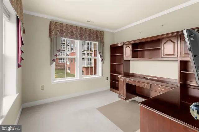 an aerial view of a house with yard swimming pool and outdoor seating