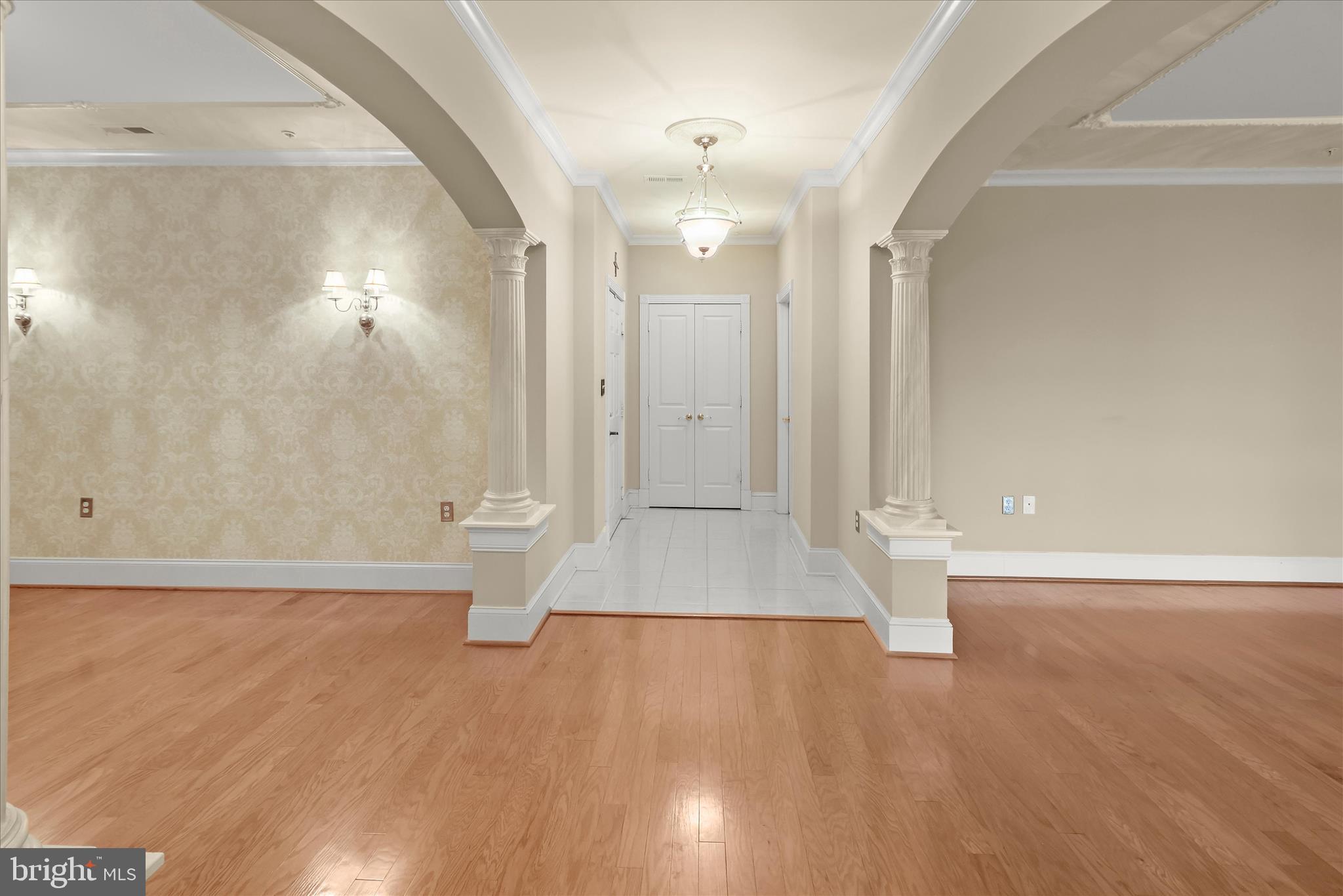 2250 Bear Den Road, Unit 104 Frederick, MD 21701 - Photo 10 of 81 Stately Columns - Crown Molding - Hardwood Floors