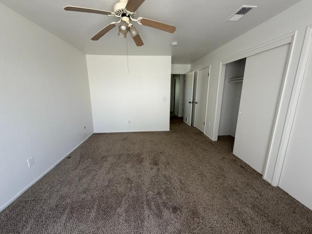 2601 Temperate Court Modesto, CA 95358 - Photo 17 of 24 a view of a chandelier fan and closet in a room