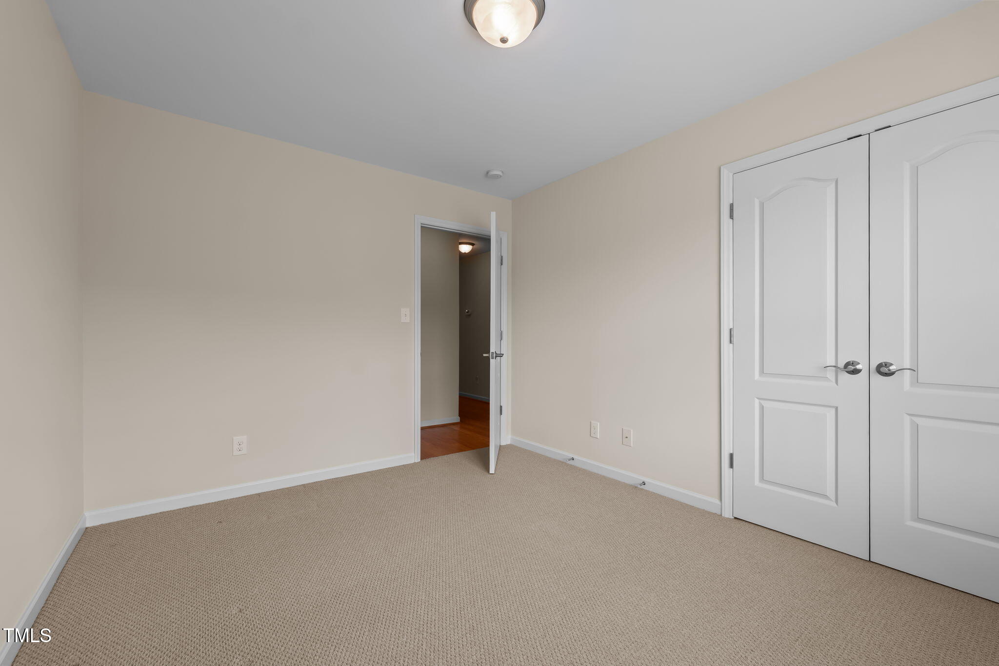 2002 Guinness Drive, Unit 5 Graham, NC 27253 - Photo 22 of 30 a view of an empty room and closet area